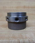 Front view of Industrial Shaft Coupling Rexnord 7300285 Straight Bore Hub with 1-1/8 in bore, showing surface rust.