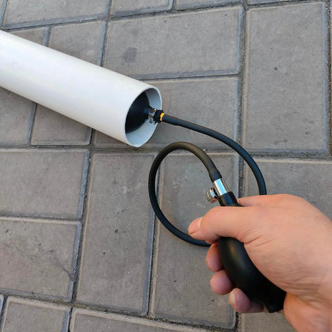 Inflatable Pipe Plug Balloon For Plumbing Tests And Pipe Sealing in white PVC pipe, hand inflating for 1.7 to 4.1 inch diameters