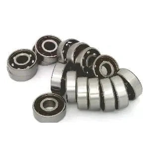 100 inline/Rollerblade/Skate Bearing Chrome Steel Open Ball bearing - Nylon Cage arranged in a group.