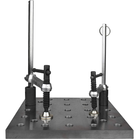 Inserta Clamp For BuildPro Tabletop With Six And A Half Inch Clamp Capacity, shown on a metal riser block with holes.