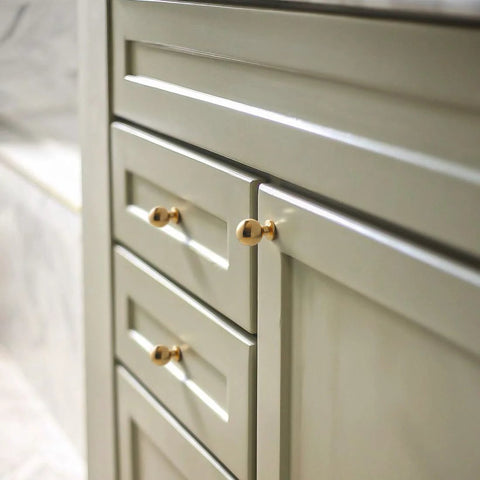 Modern 5 Pack Round Polished Brass Kitchen Drawer Knobs Bright Gold Cabinet Pulls on cupboard doors.