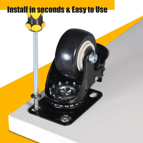 2 inch heavy duty caster wheels set of 4 rated 600 lb total silent swivel casters with locking brakes being installed on furniture
