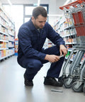 Man installing 1/2-13 Nuts Bolts Assortment With 3/4 Inch Head And Locking Nylon Nut And 1/2 Inch Caster Axle Bolt In Galvanized Carbon Steel