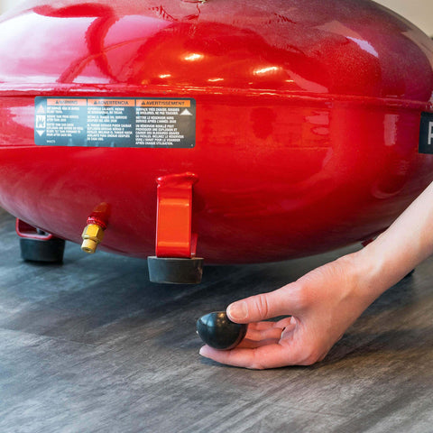 One Inch Hemisphere Rubber Bumpers With Adhesive Backing For Vibration Isolation And Shock Dampening used with a red appliance