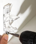 Installing a transparent clip with a drill on a cabinet, part of 8 Pairs False Front Cabinet Clips for Kitchen Cabinets set