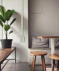 Living room with NM2-D Nonmetallic Plastic Raceway For Extending Power And Concealing Cords Outlet Kit installed on wall