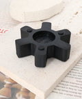 Black NBR rubber insert from 2 Pack L099 L100 Jaw Coupling Inserts For Lovejoy Martin Browning, shown on light surface.