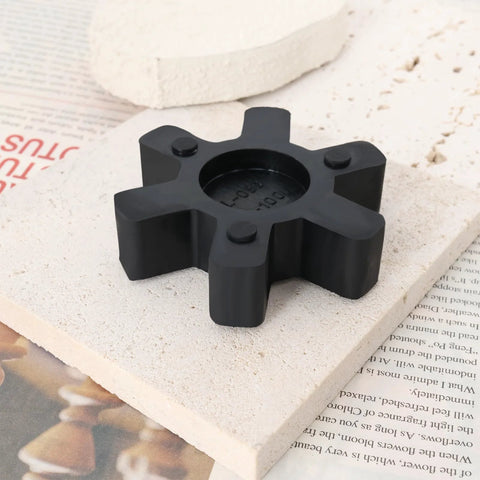 Black NBR rubber insert from 2 Pack L099 L100 Jaw Coupling Inserts For Lovejoy Martin Browning, shown on light surface.