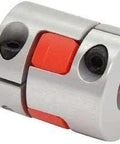 NBK Japan MJC-14-RD 6.35mm to 1/4" Jaw-type Flexible Coupling, showing metal body and red insert, side view.