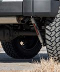 Installed Front Shocks For Jeep Wrangler TJ And Cherokee XJ 5-6.5 Inch Travel N3 With 10-Stage Variable Valving, rear view close-up.