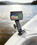 Kayak with 4 Inch Tough Track Mount Base with 1.5 Inch Ball T Bolt Track Rail, holding fish finder, on water, stainless screws visible