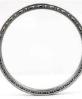 KB020CP0 Bearing - Slim Thin Section 2"x 2-5/8" inch with open brass cage and ball bearings, front view.