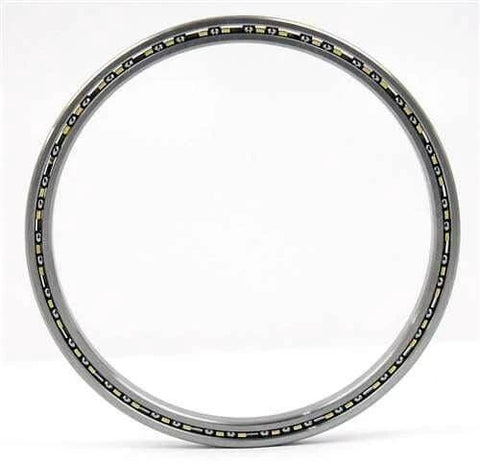 KB025CP0 Slim Section Bearing ID 2 1/2 OD 3 1/8 Width 5/16 front view highlighting brass cage.