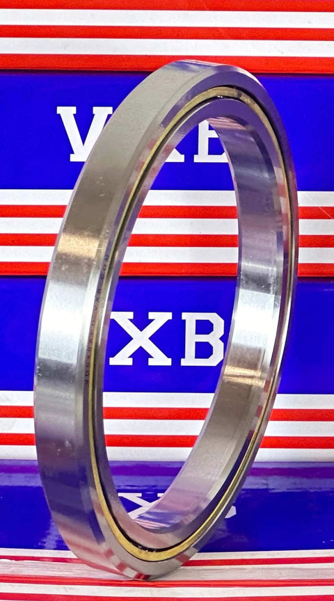 KD040XP0 Thin Section Bearing X Four-Point Contact Slim Bearing ID 4" OD 5" Width 1/2" inch side view on colorful background.