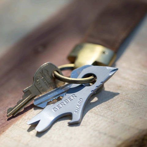 Shard 7 In 1 Keychain Multitool With Bottle Opener And Screwdriver on keyring, stainless steel with titanium nitride coating, close-up
