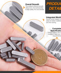 Hand holding feather keys from Comprehensive Keystock Kit With 140 Pieces In 16 Sizes Featuring Round Ended Feather Keys And Parallel Drive Shaft Keys