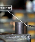 Close-up of KFD Series High Speed Steel Drill Bits Split Point One Eighth Inch drilling into metal with 135-degree split point tip.