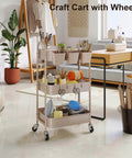 Khaki 3 Tier Metal Utility Rolling Cart With Lockable Wheels And Mesh Storage Baskets in a craft room setting