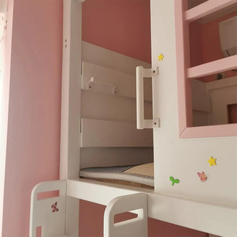 White children's bunk bed with pink accents and decorative stickers in a pink room