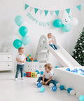 Children playing with Ball Pit Balls for Kids, Plastic Play Balls Blue Balls for Ball Pits, in a festive playroom setting.