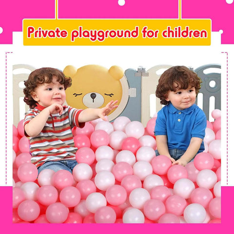 Two toddlers playing in a ball pit filled with pink and white 100 Ball Pit Balls for Kids, Plastic Balls for Ball Pit, Play Balls for Toddlers Babies
