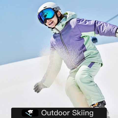 Child skiing downhill wearing kids ski goggles for boys and girls ages 5 to 14 safe TPU frame anti fog lenses, smiling in winter gear.