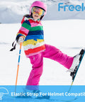 Child skiing in pink and rainbow gear wearing Kids Ski Goggles Anti Fog UV Protection Mirror Lenses For Toddlers Youth Snow.