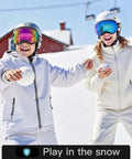 Children wearing kids ski goggles for boys and girls ages 5 to 14, safe TPU frame, anti fog lenses, playing in the snow.