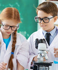 Children in lab coats wearing Two Pairs Side Shields For Glasses Slip On Eye Protection Fits Most Eyewear while working with a microscope.