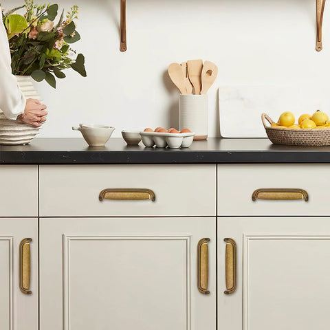Kitchen cabinets with 10 Pack 3 Inch Hole Center Vintage Drawer Pulls Antique Brass Cabinet Handles displayed in a modern setup