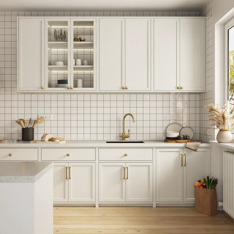 Modern kitchen with Champagne Bronze Cabinet Pulls 10 Pack 5 1 16 Inch Solid Zinc Alloy on white cabinets and drawers.