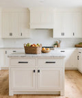 Kitchen with Matte Black Cabinet Handles 5 Inch 128mm Hole Centers Solid Zinc Alloy Drawer Pulls on white cabinets.