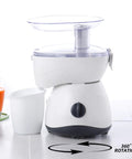 16 Pcs Self Adhesive Caster Wheels For Countertops And Small Appliances, Easy Peel And Stick Furniture Sliders For Coffee Makers, Blenders, Air Fryers And Other Kitchen Equipment, Black installed on a small white kitchen appliance on countertop.
