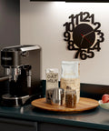 Kitchen countertop with black coffee machine and 18 Inch Acacia Wood Lazy Susan For Tabletop And Countertop Use serving tray.