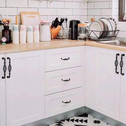 Four Pack Birdcage Style Cast Iron Antique Cabinet Hardware Handles With Center Hole Mount for kitchen cabinets in black finish.