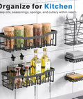 Adhesive Shower Caddy Set 5 Pack Rustproof Stainless Steel Bath Organizers With Large Capacity No Drilling Mounts For Tile And Glass Surfaces Including Two Caddies Two Soap Holders And One Toothbrush Holder Ideal For Bathroom Storage And Home Decor displayed with spices, bottles, cutlery, and towels.