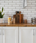 Modern kitchen with Two Pack Silver 5.5 Inch Square Cabinet Pulls Stainless Steel Drawer Handles installed on white cupboards.