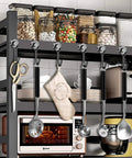 Kitchen storage shelf with jars, utensils, and appliances, including toaster and oven, organized for convenient access.