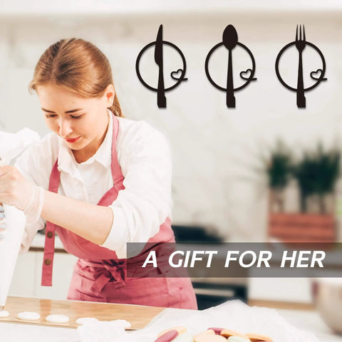 Three-Piece Knife, Fork and Spoon Kitchen Hook - Metal Wall Hanging displayed in a kitchen as a gift for women
