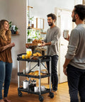 Heavy Duty Folding Utility Cart With 3 Tier Shelves DWVO 240 Lb Load Capacity in kitchen with coffee and pastries