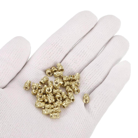 Knurled Insert Nuts, 100pcs M3 x 7mm L x 5mm OD 3D Printing Brass Nuts Female Threaded Inserts Brass Heat Set Insert Embedment Nuts on a glove