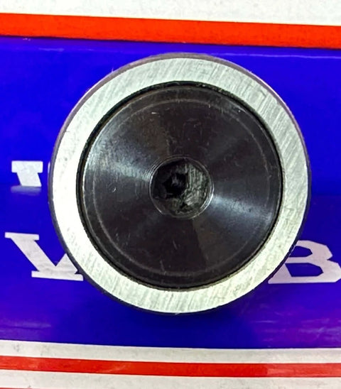 Front view of KR32 32mm Cam Follower Needle Roller Bearing, showing the central component against a blue background.