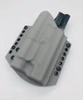 Kydex Concealment Holster For FN 5.7 MRD MK3 With Light And Laser Bearing, showing side view with rivet detailing, Nestor Series
