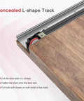 Close-up of concealed L-shape track from 36" Concealed Sliding Barn Door Hardware Kit with Soft Close for 28in passage opening
