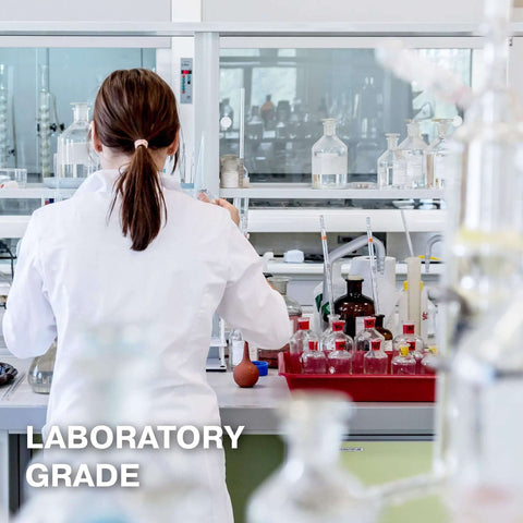 Scientist in lab using Isopropyl Alcohol 99.9% Technical Grade, 32 Oz Bottles Four Pack, High Purity Cleaning Solvent For Labs And Electronics