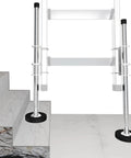 Adjustable Ladder Leveler Pair For Stairs And All Surfaces Anti Skid Alloy Steel Feet With Removable Rubber Caps installed on stairs