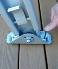 User adjusting Permanent Mount Ladder Levelers For Uneven Surfaces 2 Legs Complete Kit By Levelok, showing close-up of locking system.