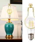 Lamp with 2 Pack 22mm Metal Ball Lamp Finials Caps And Knob With Classic Style Decorative Screw Cap Nuts in silver installed on shade holder.
