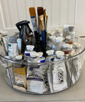 Rotating Makeup Organizer Turntable 11.5 Inch Large Cosmetic Storage with five dividers, filled with art supplies like paints and brushes.
