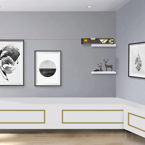 Versatile 2-in-1 laser level blends a 12 inch spirit level with a bright red laser, magnetic base, and long reach used for hanging pictures